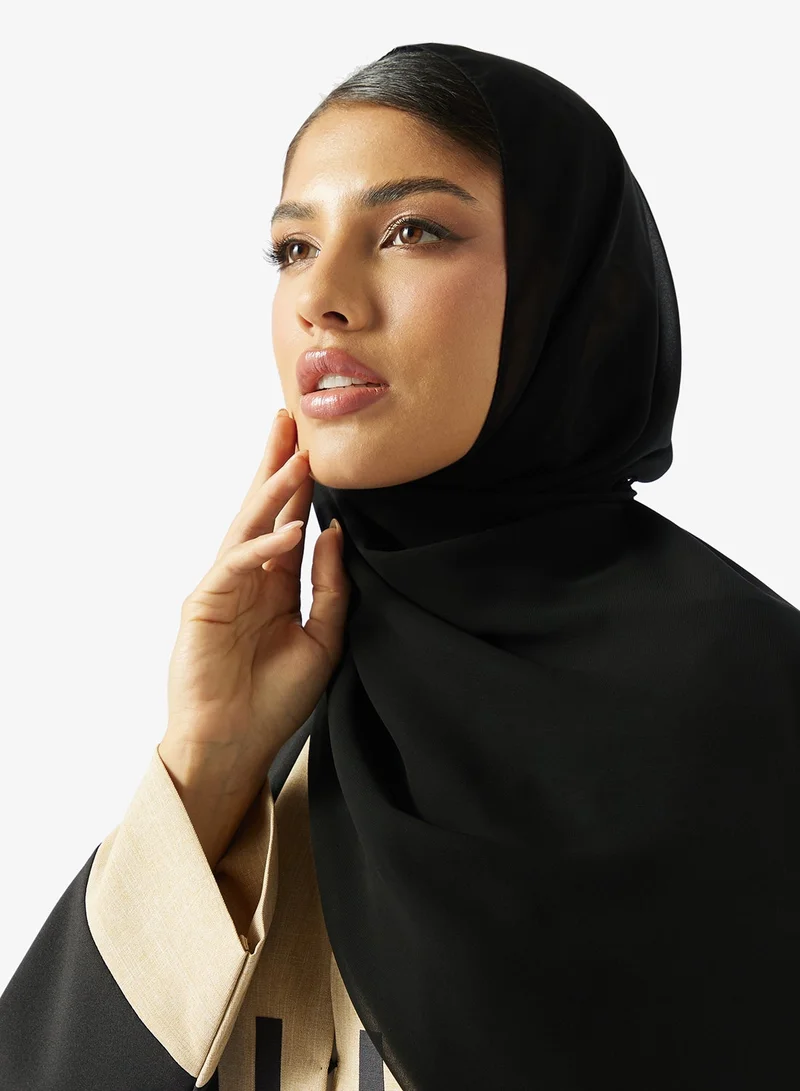 hayas closet  Black Abaya with Button Details and Sheila for Women | Best Price UAE